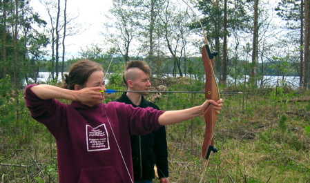 Matsku and Jose practising archery in Aallonranta